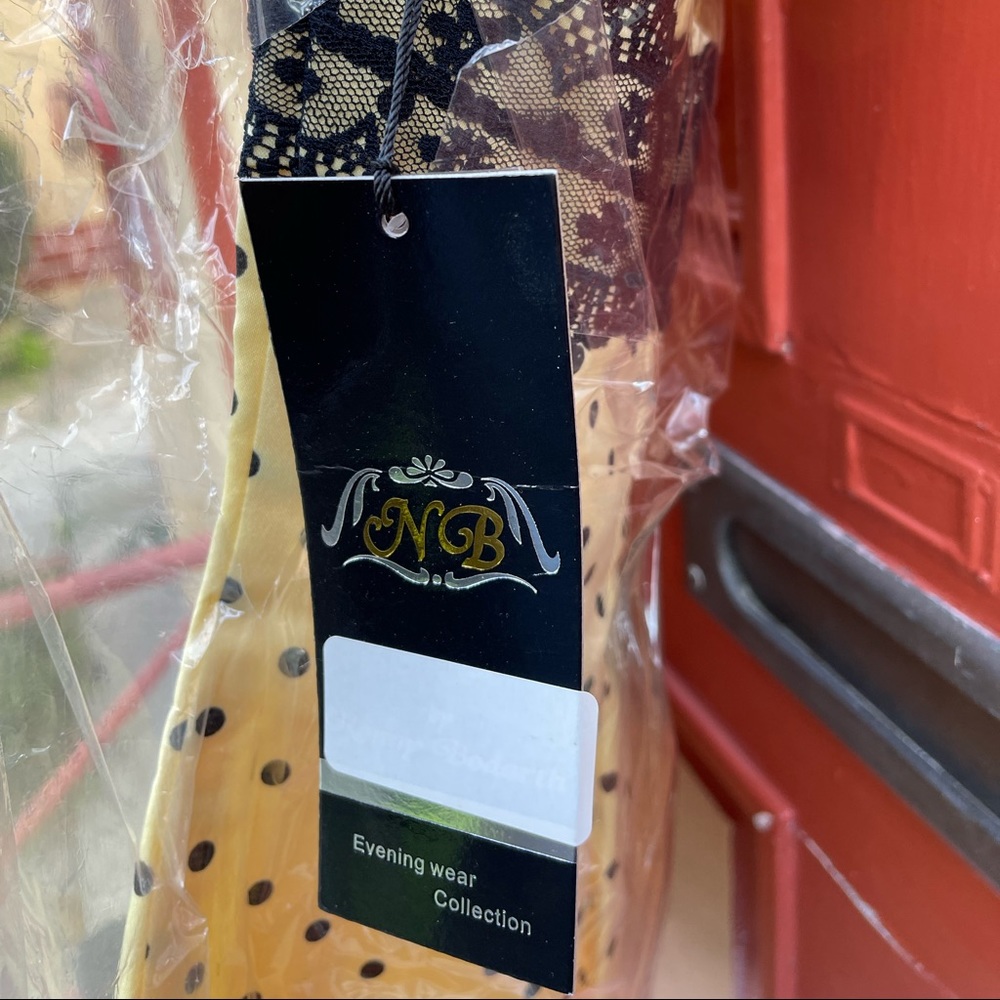 New with tags Yellow/ Black polka dot dress
